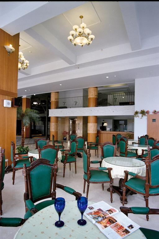 Jing Ai Hotel Лодун Экстерьер фото